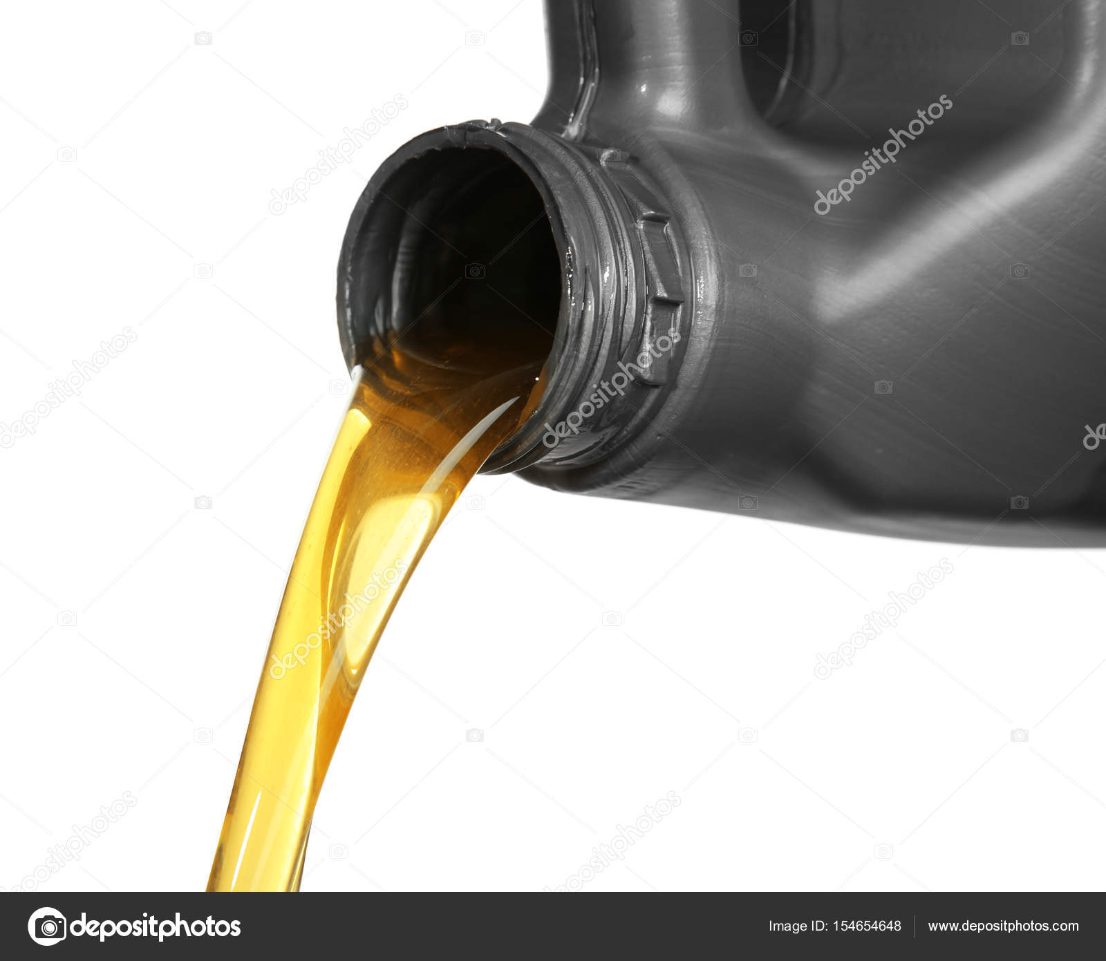 Engine oil pouring from canister Stock Photo by ©belchonock 154654648