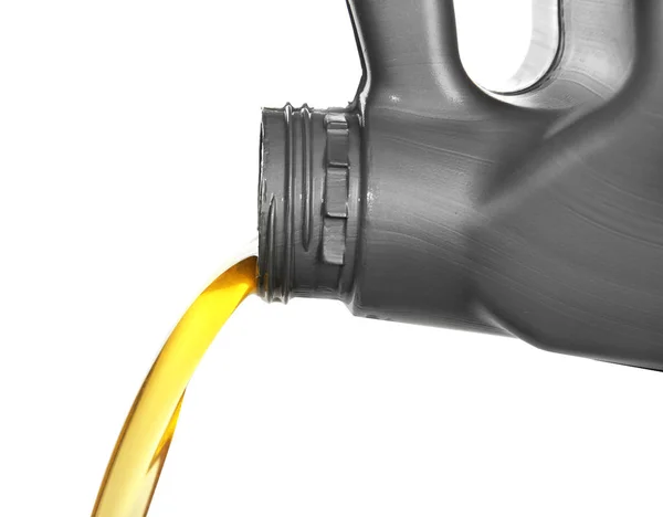 Engine oil pouring from canister — Stock Photo, Image