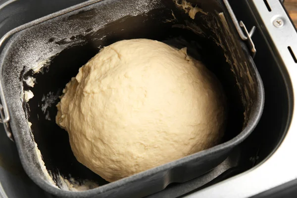 Raw dough in bread machine