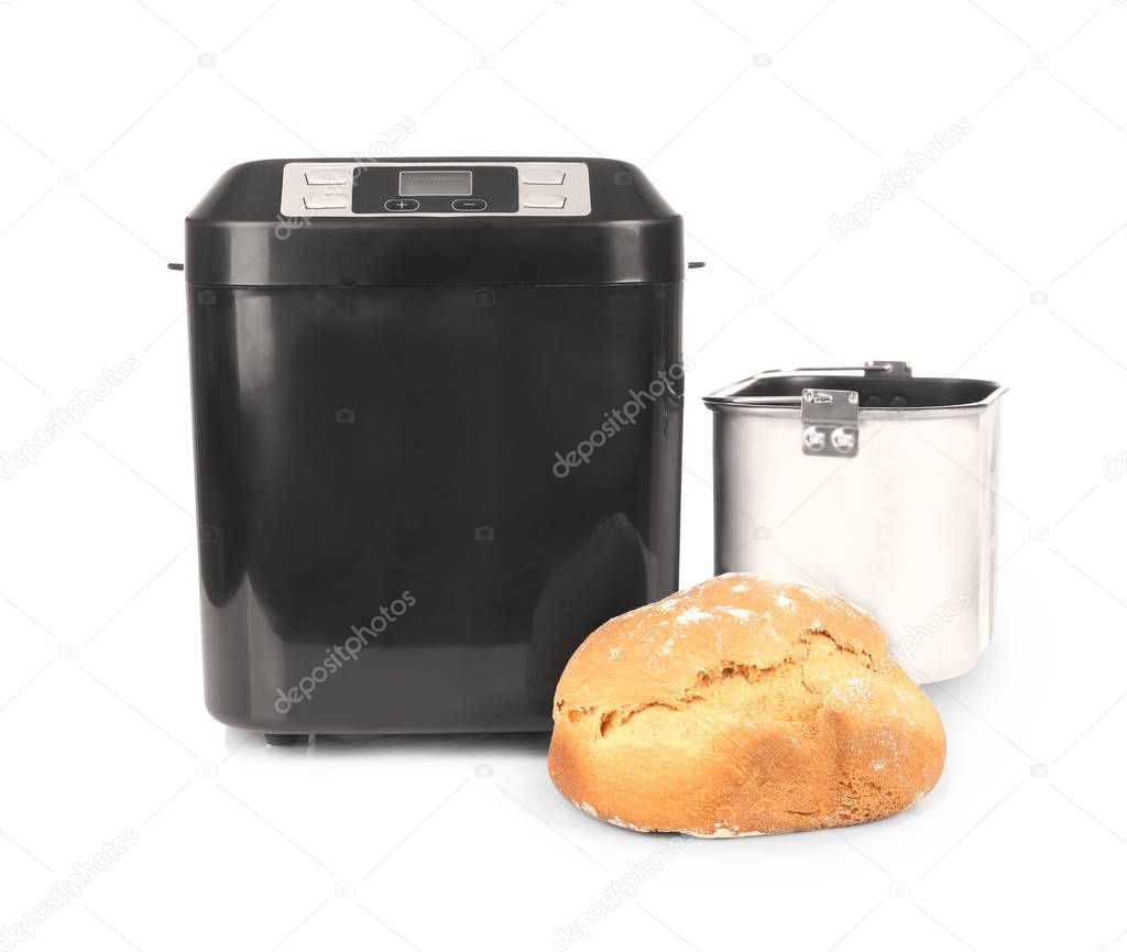 Modern bread machine and fresh crusty loaf 