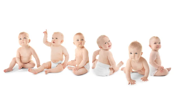 Barndomskonsept. Søte babyer med hvit bakgrunn – stockfoto