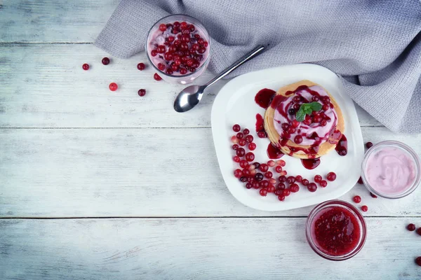 Tasty pancakes with yogurt — Stock Photo, Image