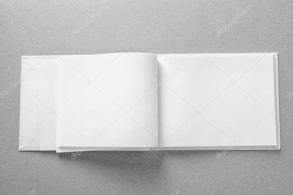 Opened book with blank pages 