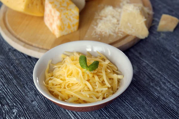 Bowl with grated cheese — Stock Photo, Image