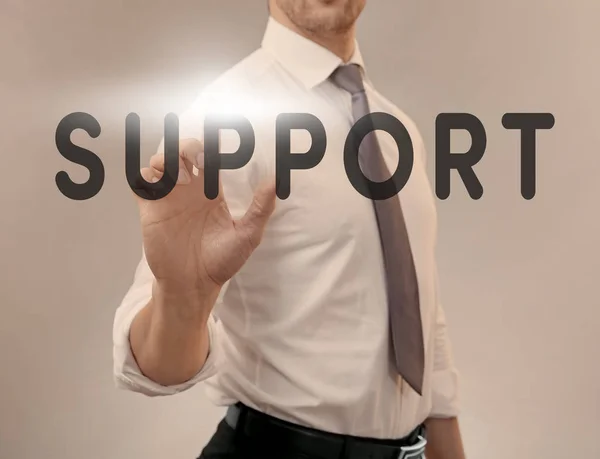 Uomo che punta sul testo Supporto — Foto Stock