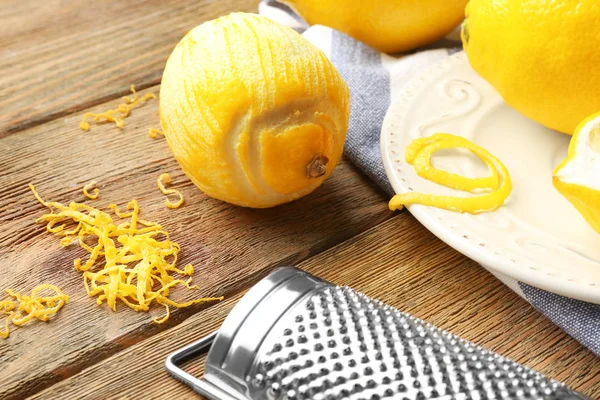 Peeled lemon and grater — Stock Photo, Image