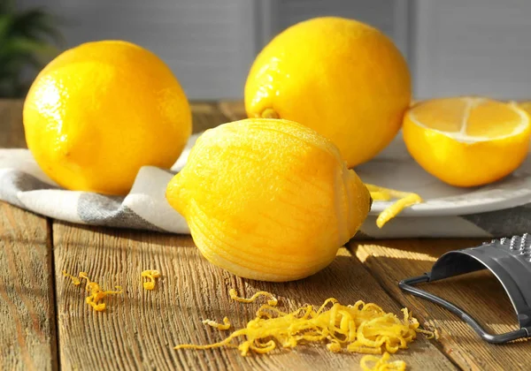 Composition with lemons and zest — Stock Photo, Image