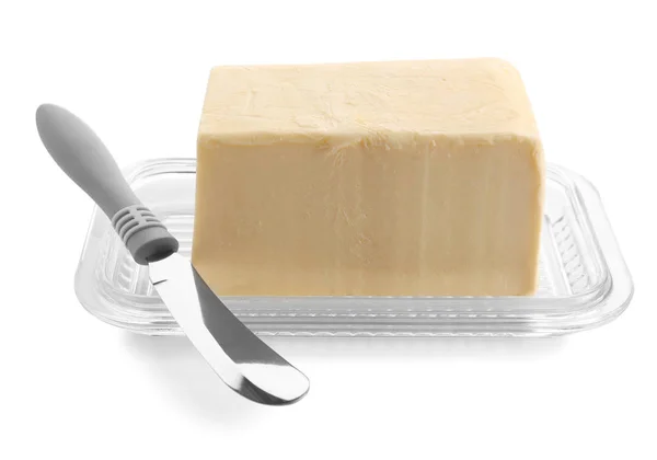 Dish with butter and knife — Stock Photo, Image