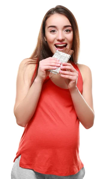 Young pregnant woman with chocolate — Stock Photo, Image
