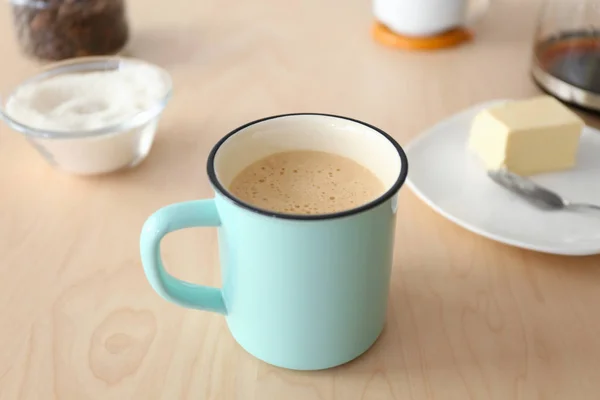 Kopje koffie met boter — Stockfoto