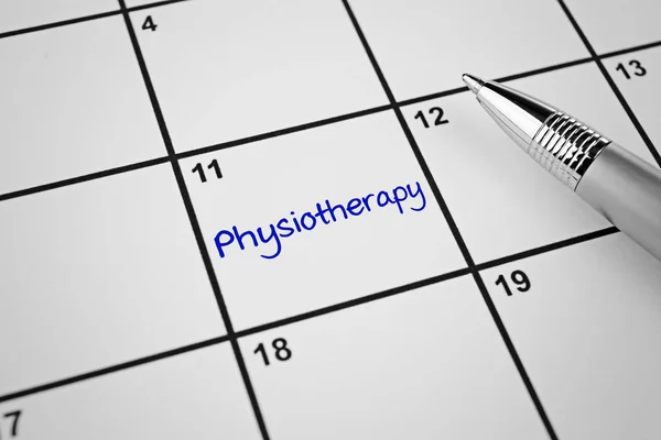 Word PHYSIOTHERAPY written in planner — Stock Photo, Image