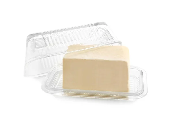 Gericht mit Butter auf weißem Hintergrund — Stockfoto