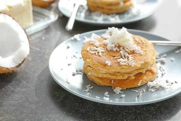 Plate with tasty homemade coconut pancakes — Stock Photo, Image