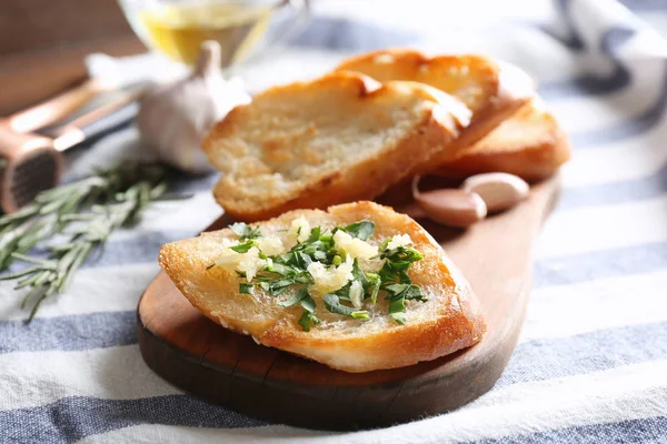 Bread slices with garlic — Stock Photo, Image