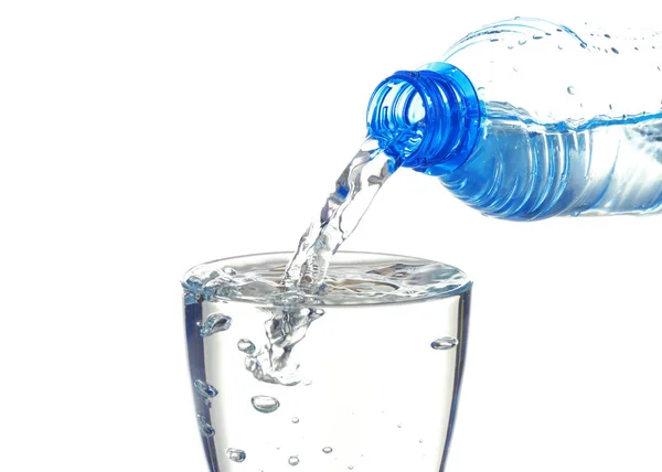 Water pouring from plastic bottle — Stock Photo, Image