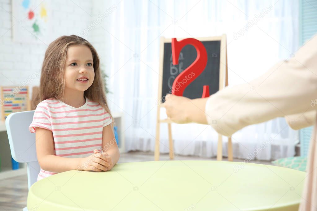 Little girl with teacher 