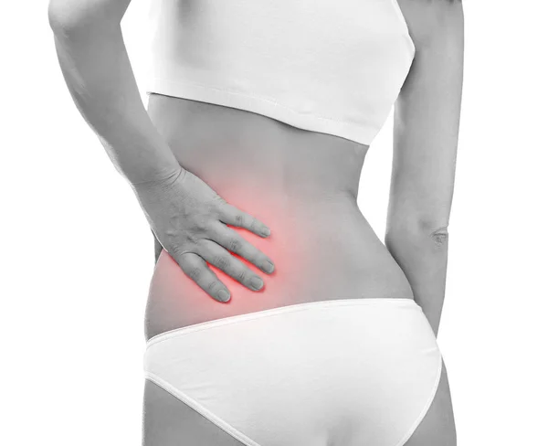 Woman suffering from pain in back — Stock Photo, Image