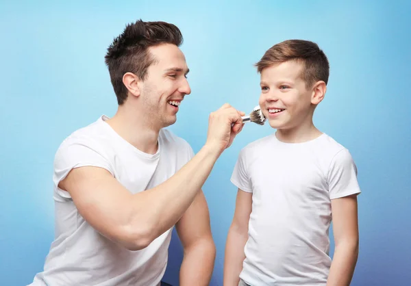 Father and son shaving — Stock Photo, Image