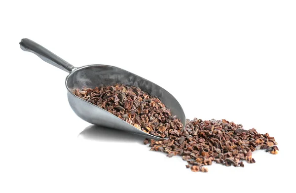 Metal scoop with cocoa nibs — Stock Photo, Image