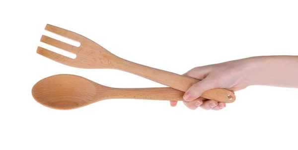 Donna che tiene cucchiaio e forchetta di legno — Foto Stock