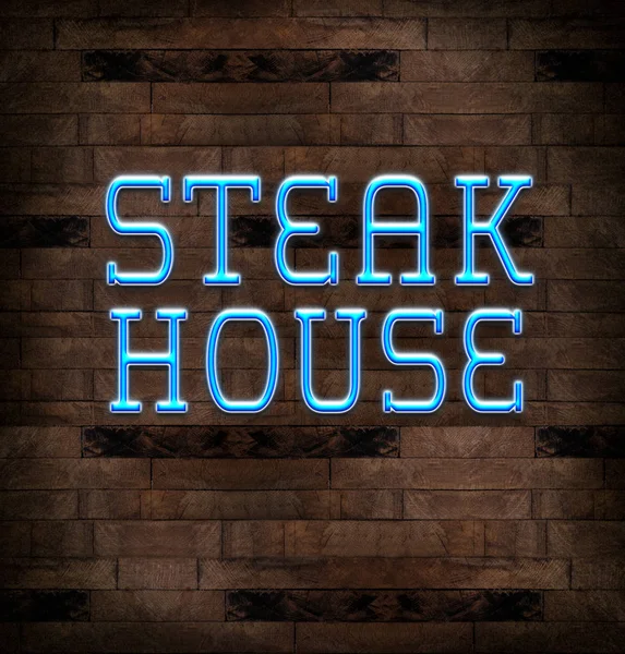 Texto STEAK HOUSE na parede de tijolo — Fotografia de Stock