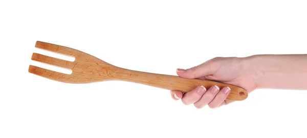 Woman holding wooden fork — Stock Photo, Image