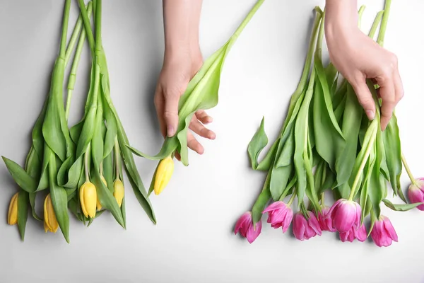 Woman holding beautiful tulips — Stock Photo, Image