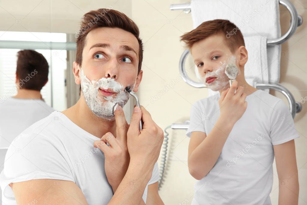 Father and son shaving 