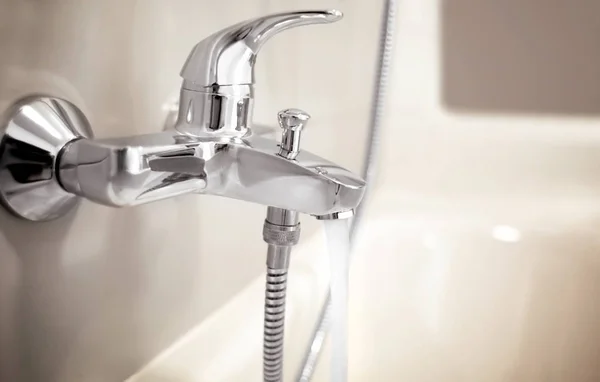 Silver tap in bathroom — Stock Photo, Image