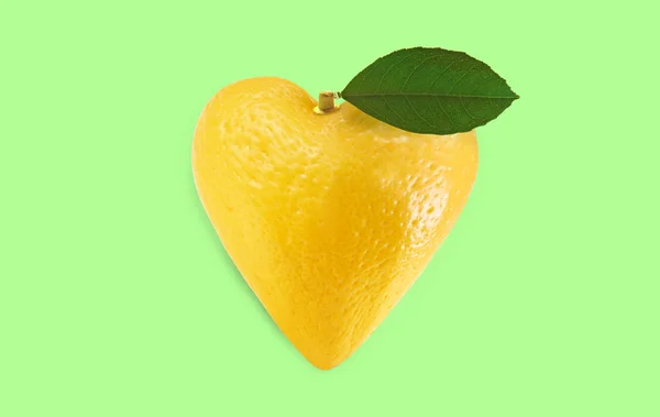 Heart shaped lemon on color background — Stock Photo, Image