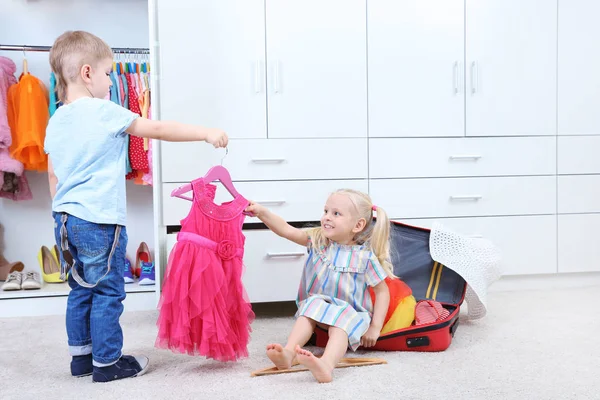 Kids playing in wardrobe — Stock Photo, Image