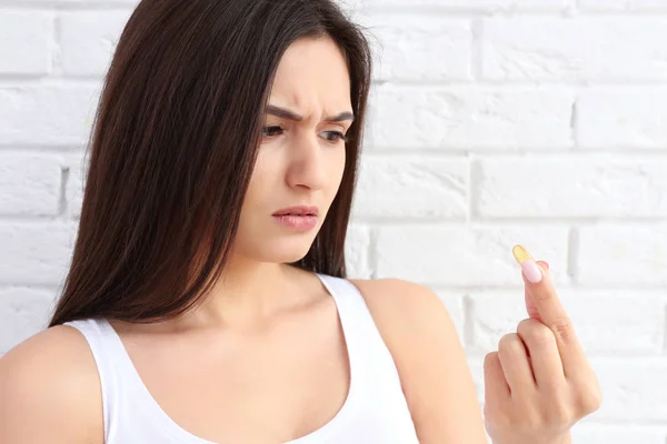 Woman taking pill — Stock Photo, Image