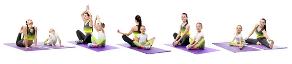 Madre e hija practicando yoga — Foto de Stock