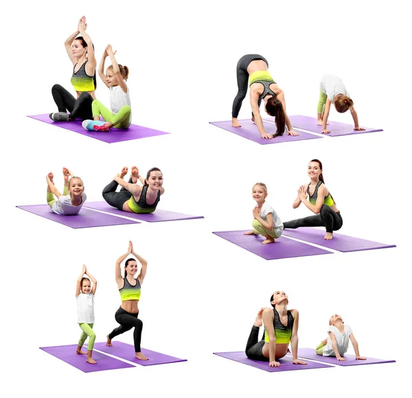 Madre e hija practicando yoga —  Fotos de Stock