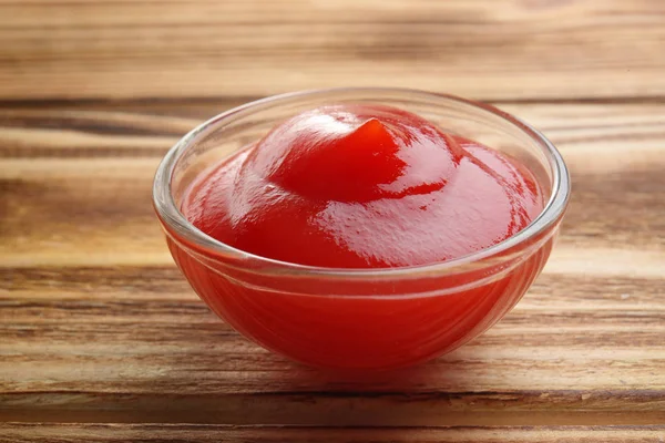 Bowl with tomato sauce — Stock Photo, Image