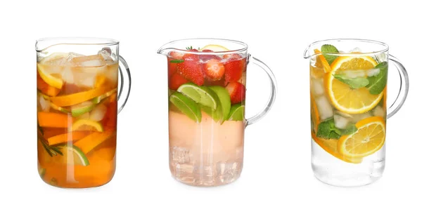 Bebidas diferentes em jarros de vidro — Fotografia de Stock