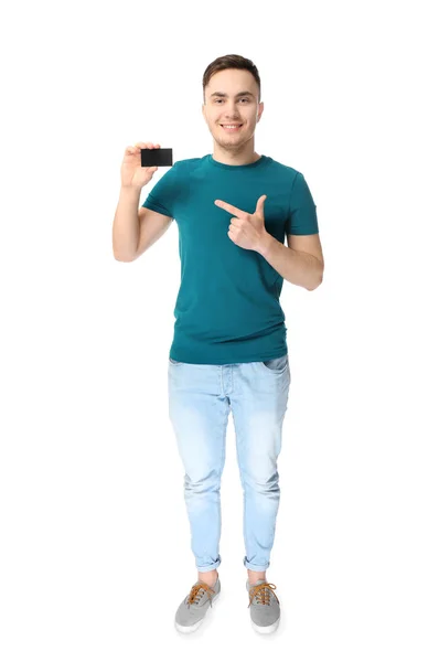 Handsome young man with business card on white background — Stock Photo, Image