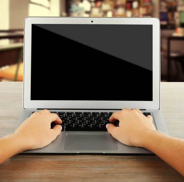 Teacher working with laptop at table — Stock Photo, Image