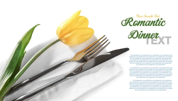 Cutlery with tulip and napkin — Stock Photo, Image