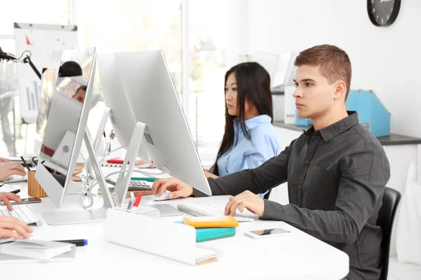 Young programmers working in office — Stock Photo, Image