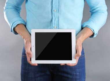 Man holding tablet clipart