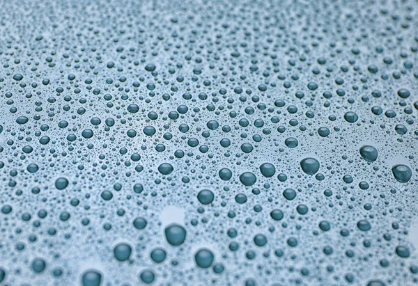 Drops on tinted window — Stock Photo, Image