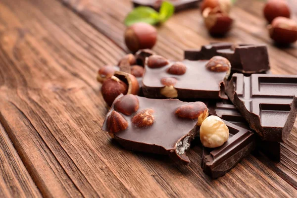 Chocolate pieces with nuts — Stock Photo, Image