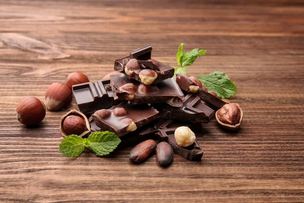 Chocolate pieces with nuts — Stock Photo, Image