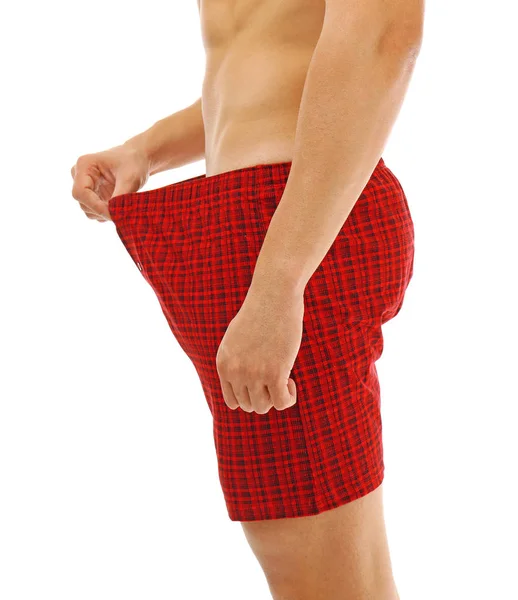 Man looking for something in boxers — Stock Photo, Image