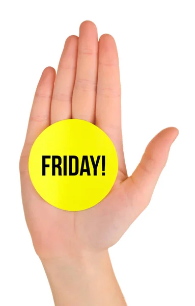 Woman holding sticker with word FRIDAY — Stock Photo, Image