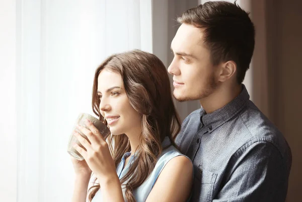 Beautiful young couple at home, closeup — Stock Photo, Image