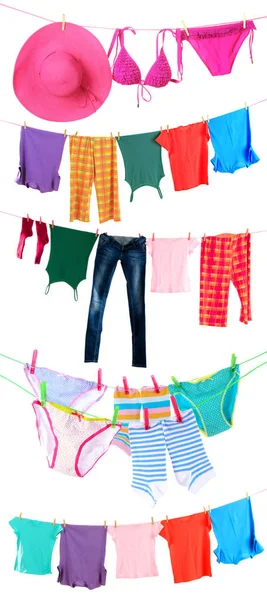 Different clothes hanging from clotheslines — Stock Photo, Image