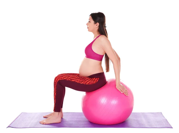 Femme enceinte faisant du yoga — Photo
