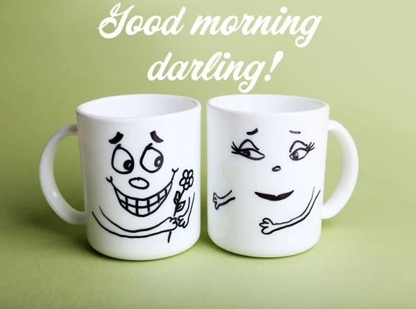 Text and cups with funny faces